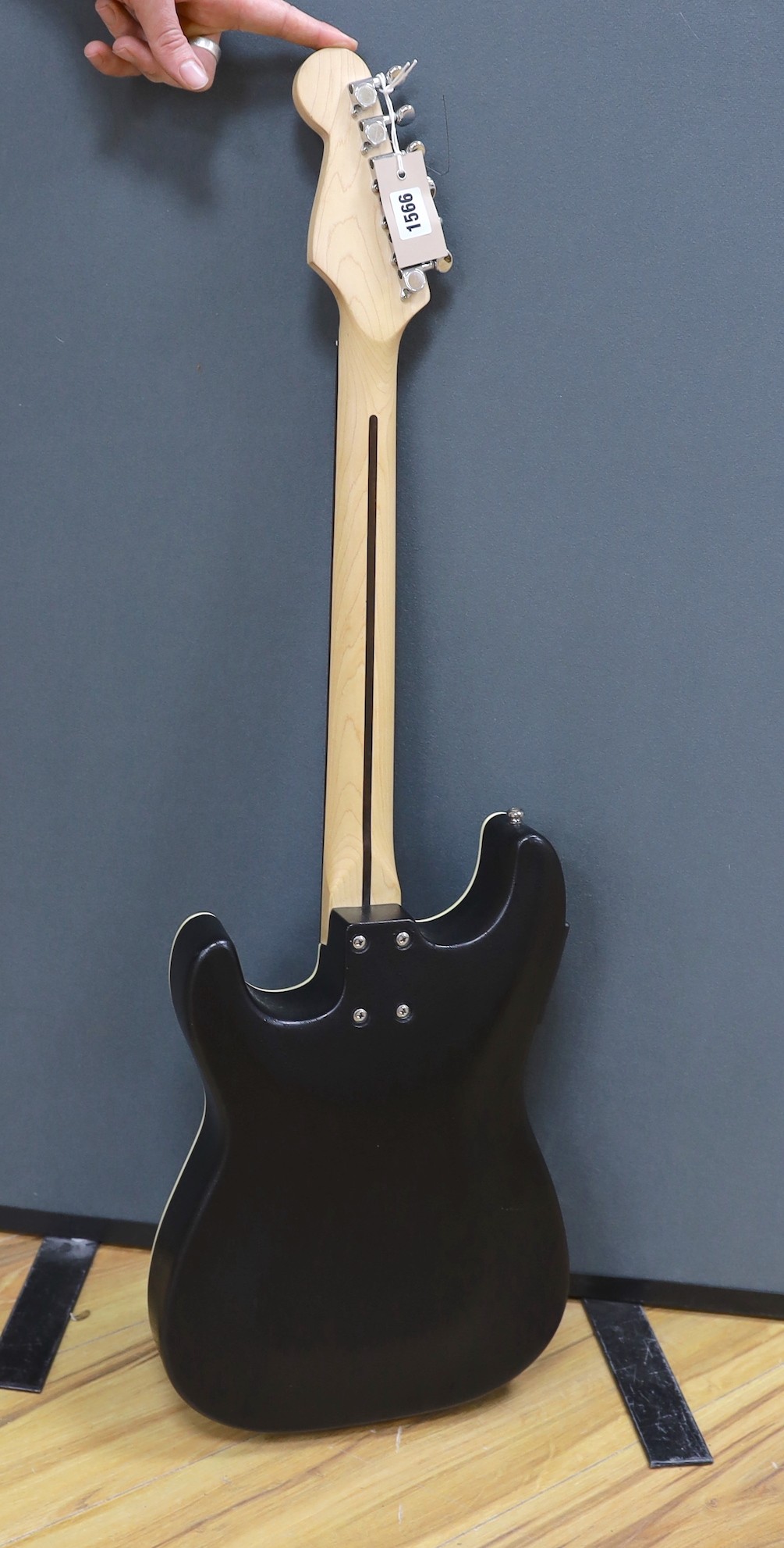 A Fender Stratacoustic electric guitar, serial no. CD04122687